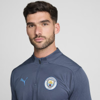 PUMA Manchester City Trainingspak 1/4-Zip 2024-2025 Donkerblauw Lichtblauw