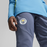 PUMA Manchester City Trainingsbroek 2024-2025 Kids Donkerblauw Lichtblauw