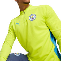 PUMA Manchester City Trainingspak 1/4-Zip 2024-2025 Geel Donkerblauw Lichtblauw